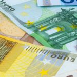 background of euro banknotes 928RGKY 1200x380 1